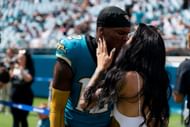 NFL: Jaguars star Travis Hunter (L) and his wife Leanna (R) - Source: Getty